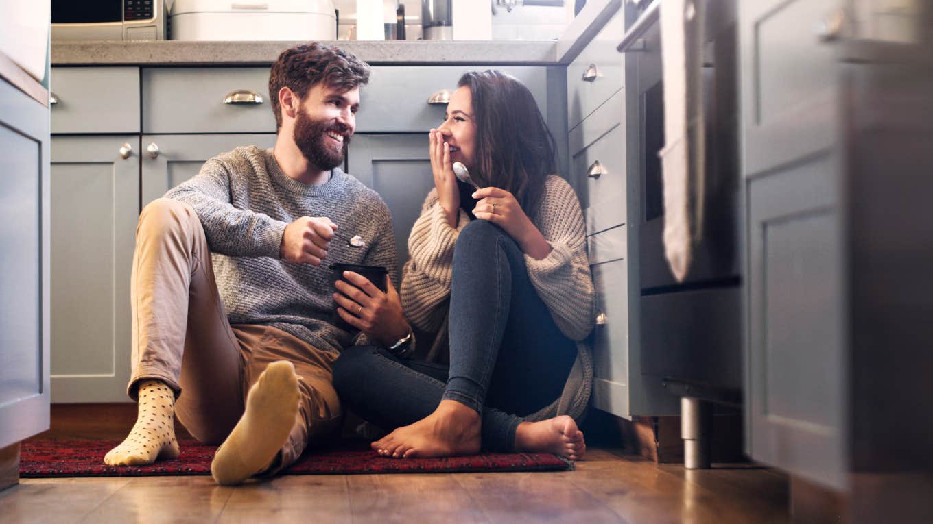 couple on kitchen floor