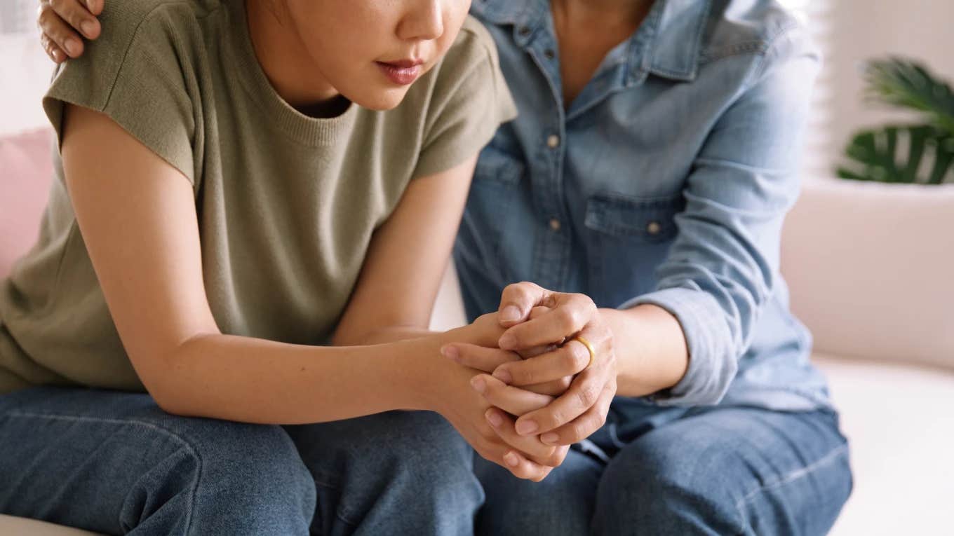 woman comforting friend