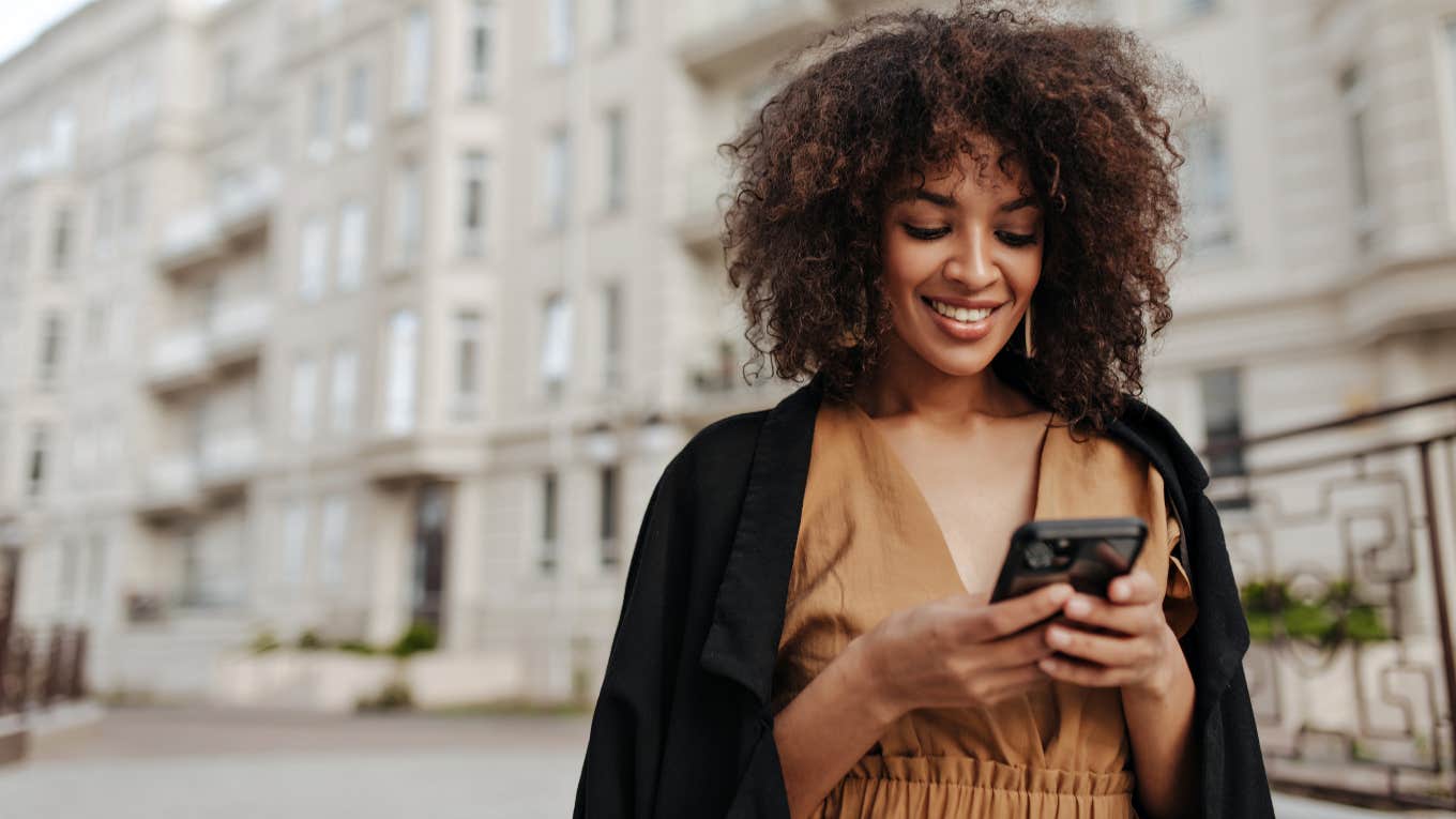 woman reading texts from an emotionally available husband