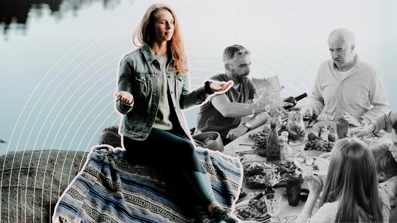 Woman sitting on a grey rock 