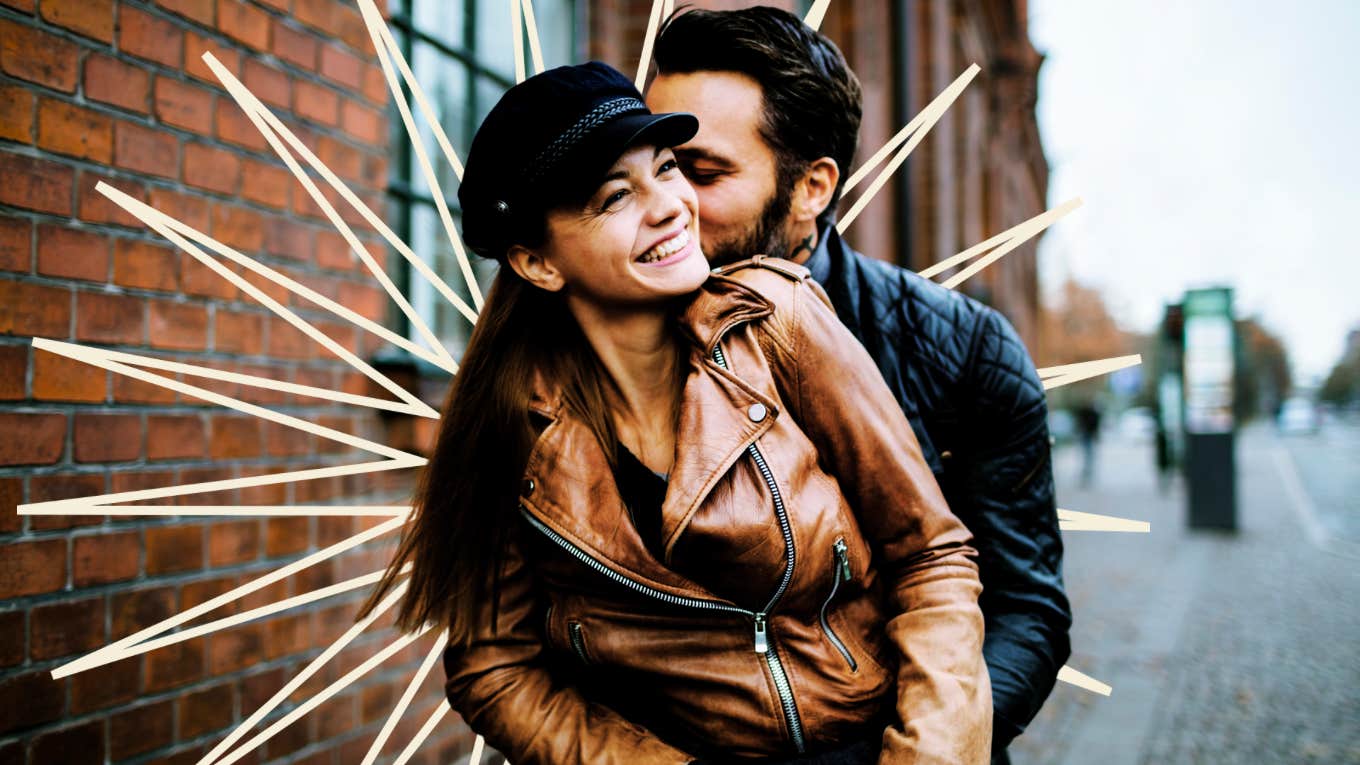 Couple hugging in street