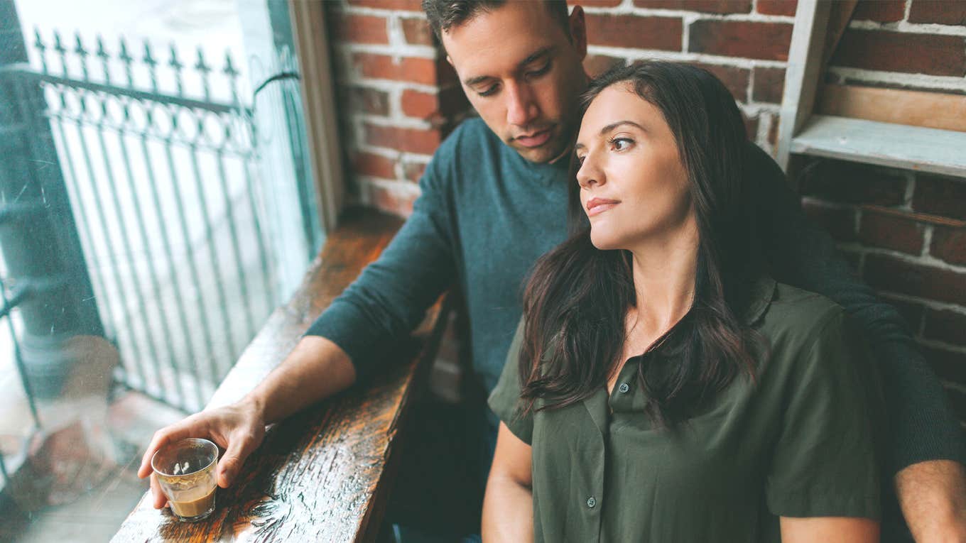 man and woman having drink at restaurant 