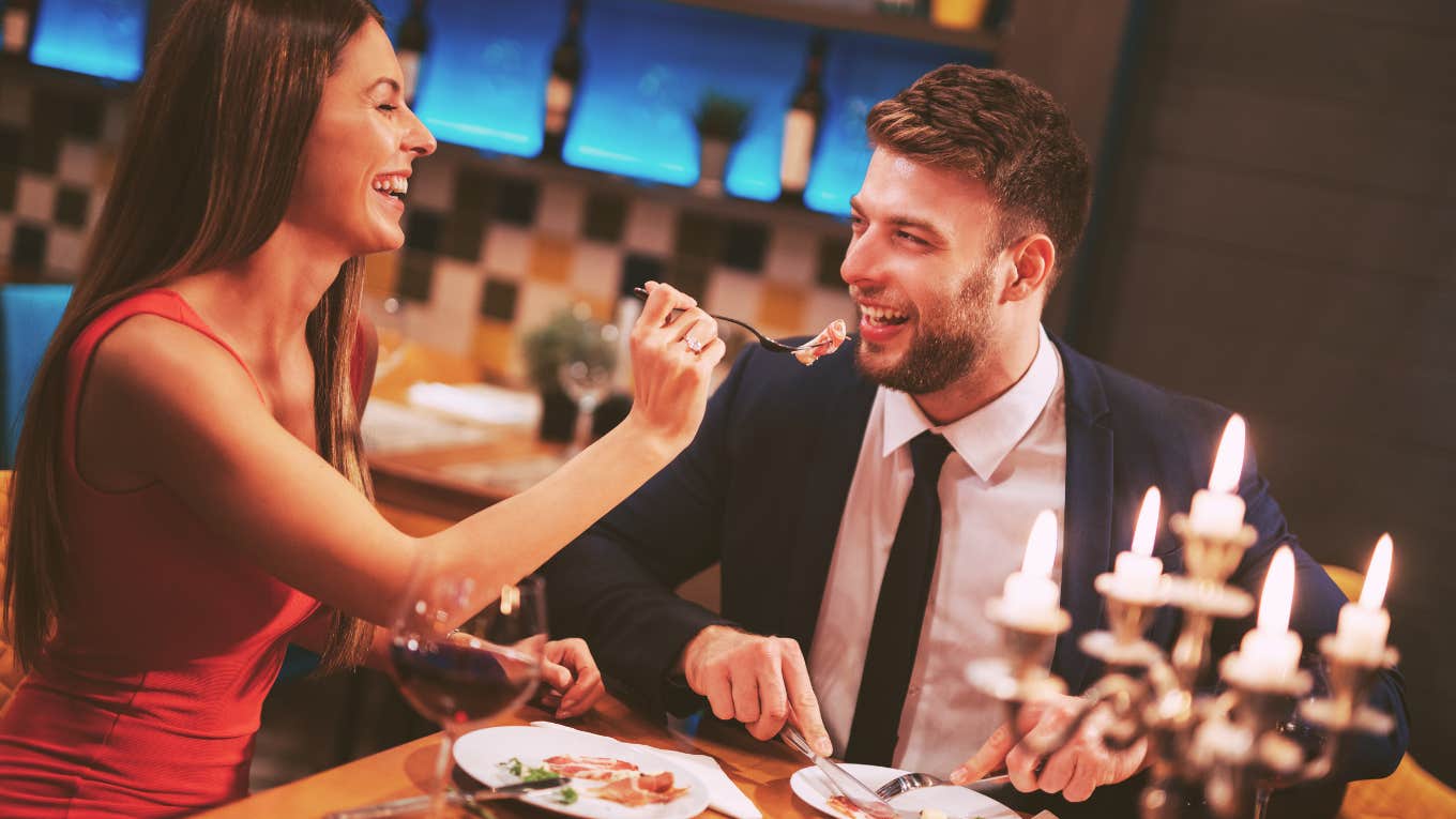 3 Tiny Tips For A More Connected Valentine's Day, According To An Attachment Specialist couple having dinner