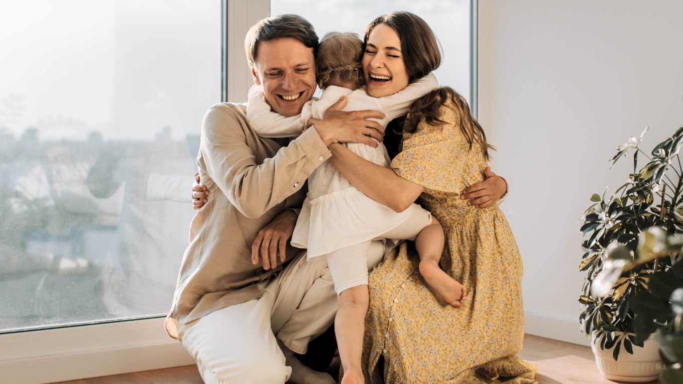 There's Only One Effective Way To Teach Your Kids About Boundaries Family hugging each other