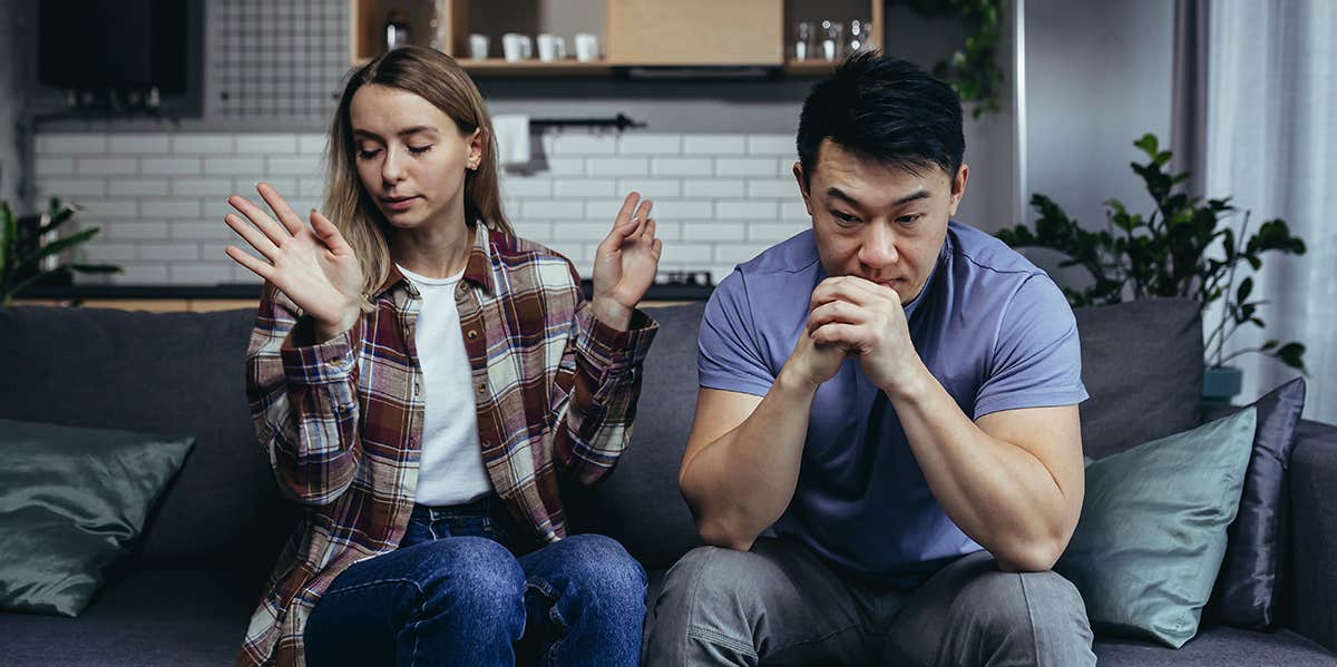 confused man with his girlfriend