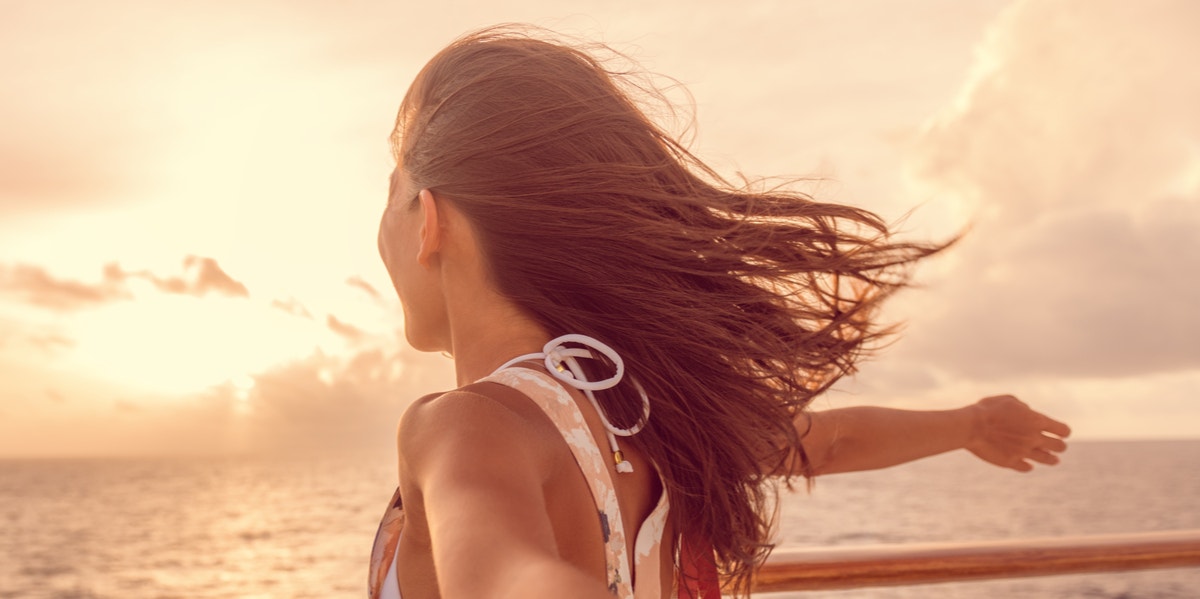 woman standing in the wind 