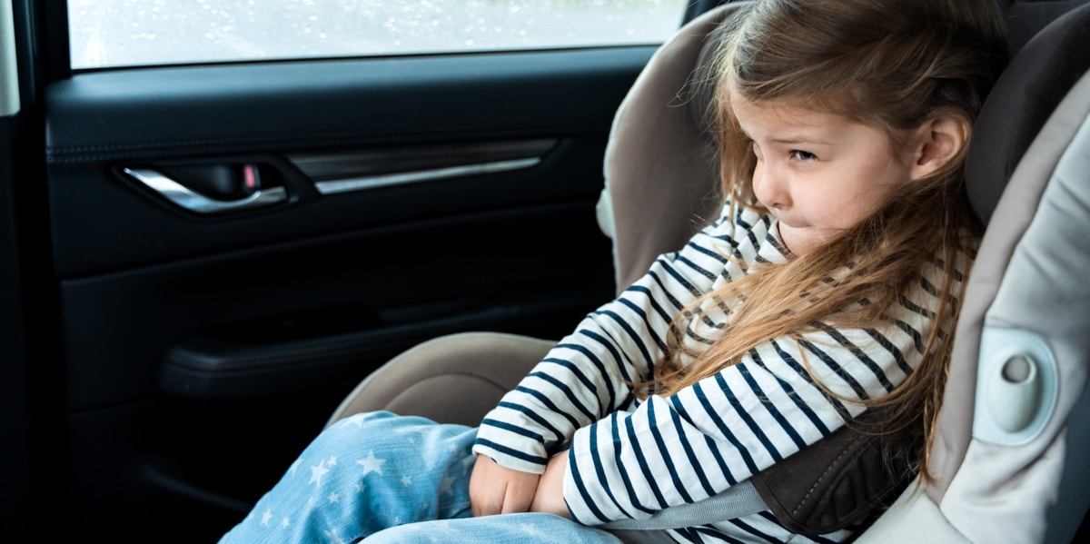 toddler girl in carseat