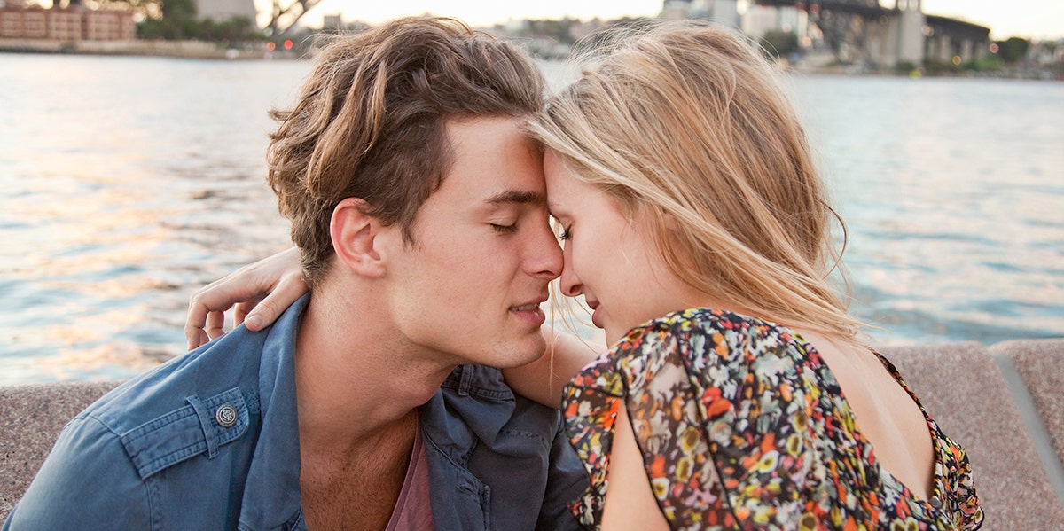Your Tone Of Voice Can Predict How Long Your Relationship Will Last couple with foreheads touching