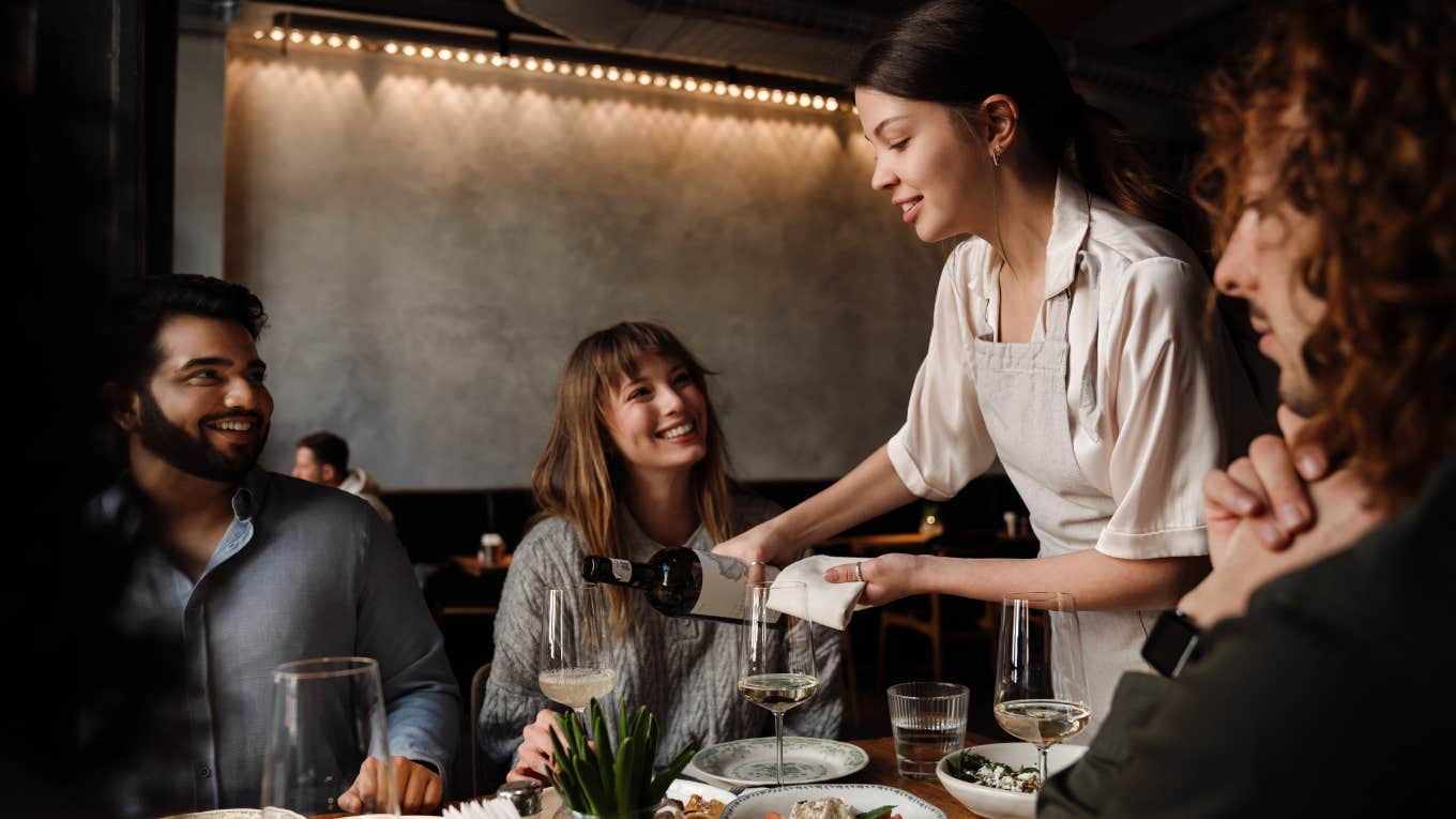 Waitress with customers