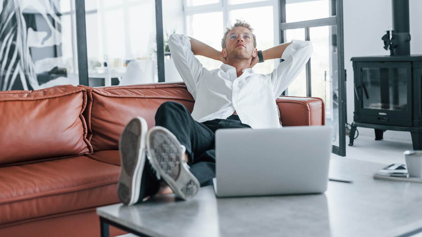 employee leaning back in desk chair