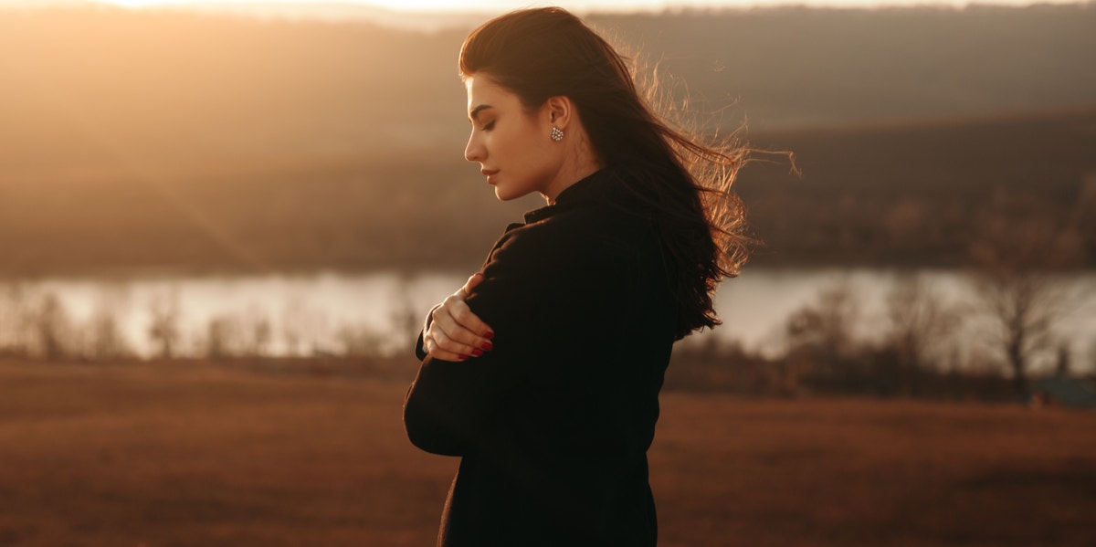 woman standing alone