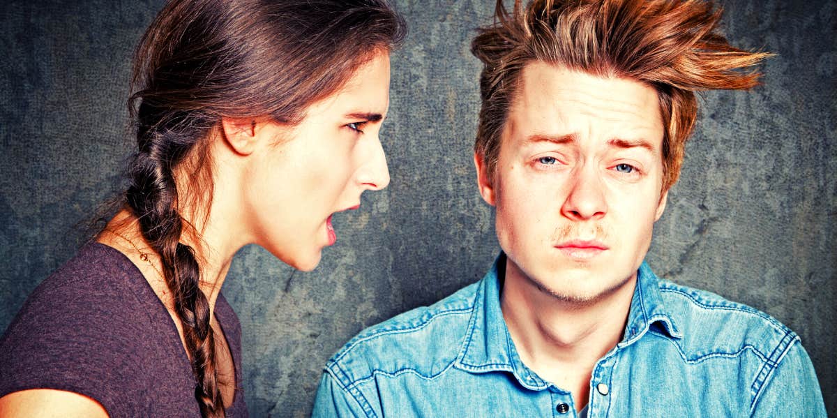 woman yelling toxic phrases at man