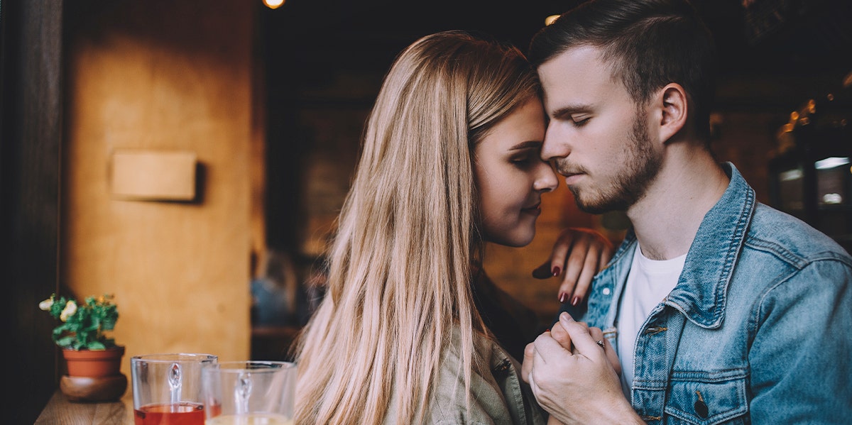 woman and man embracing