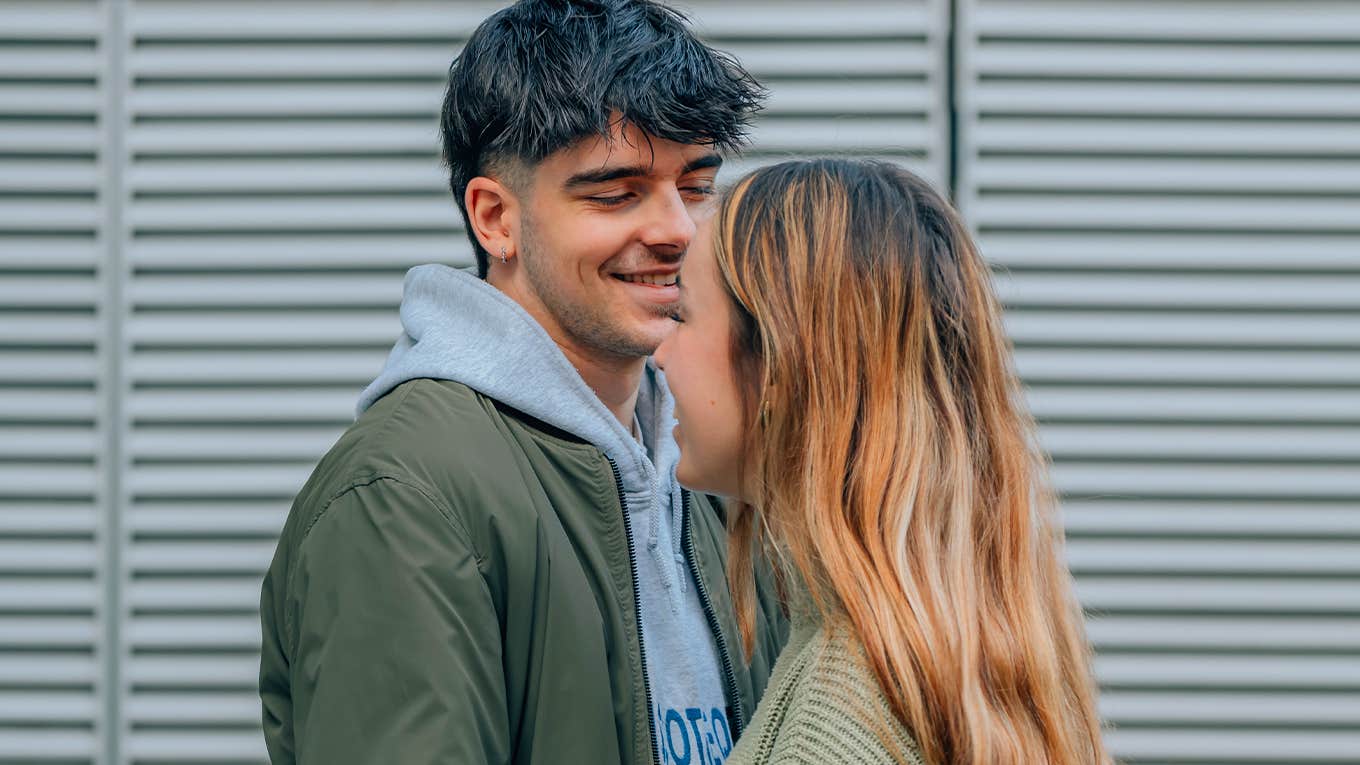 5 Tiny Traits Men Find Undeniably Hot About Women man flirting with attractive woman