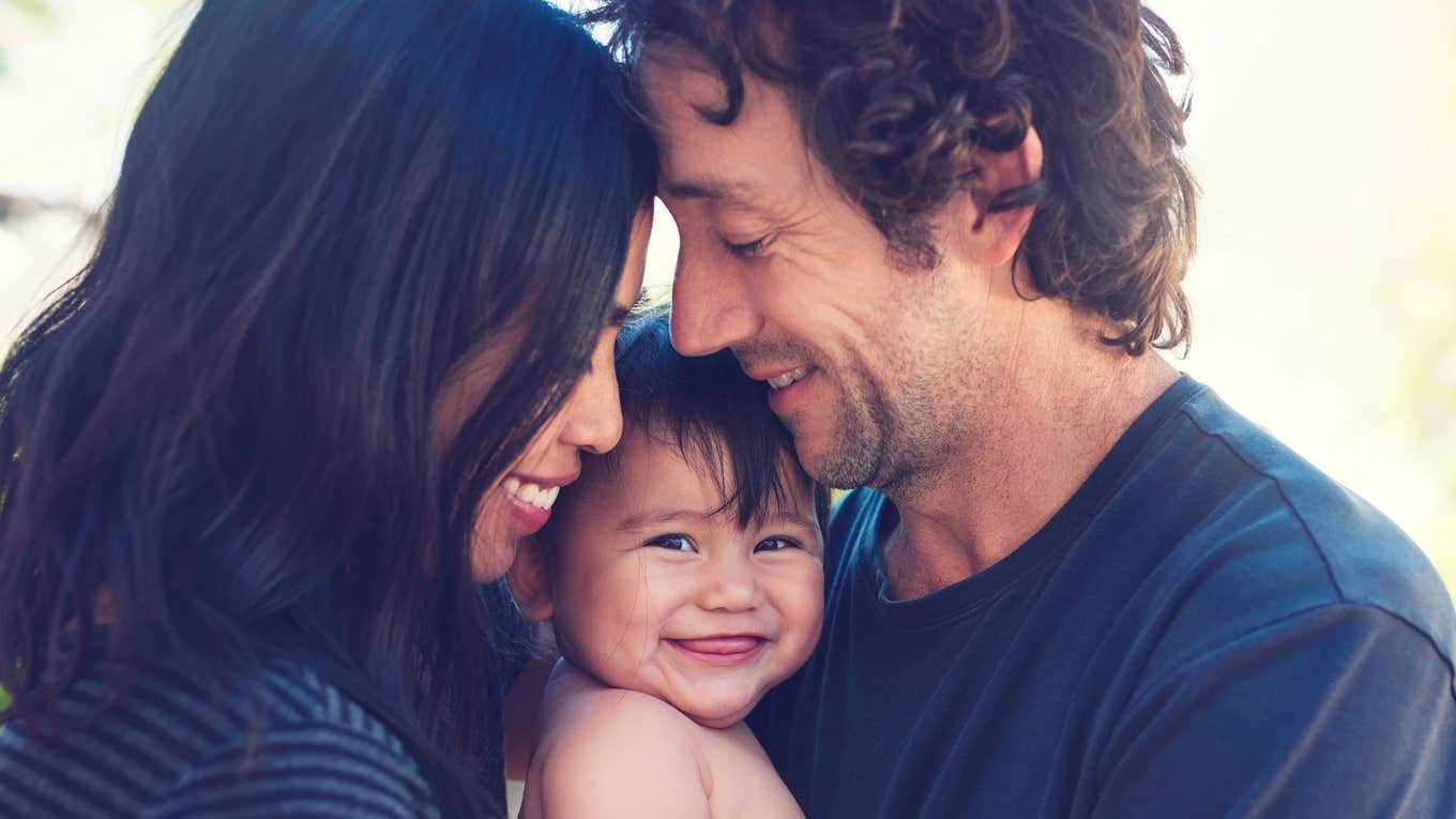 couple with their baby