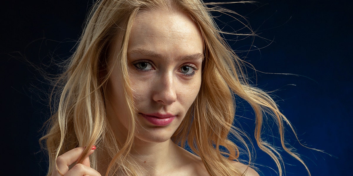 How A Trans Woman Taught Me, A Cis Man, Who I Really Am person with long hair looking at camera