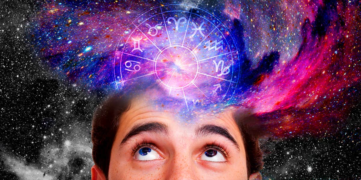Zodiac Signs Most Likely To Fall In Love During The Scorpio Moon On August 21, 2023 man looking up into galaxy
