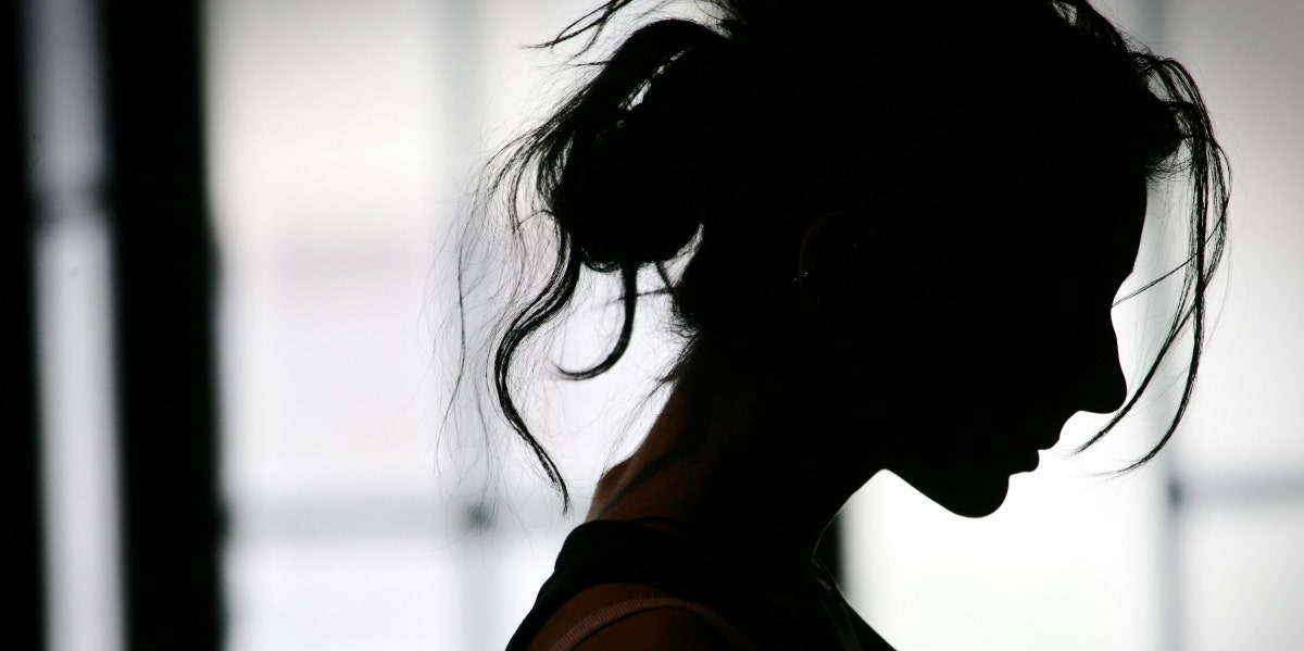 dark silhouette of woman 