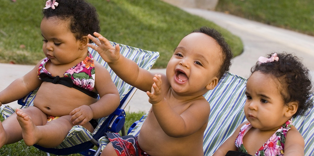 triplets playing together