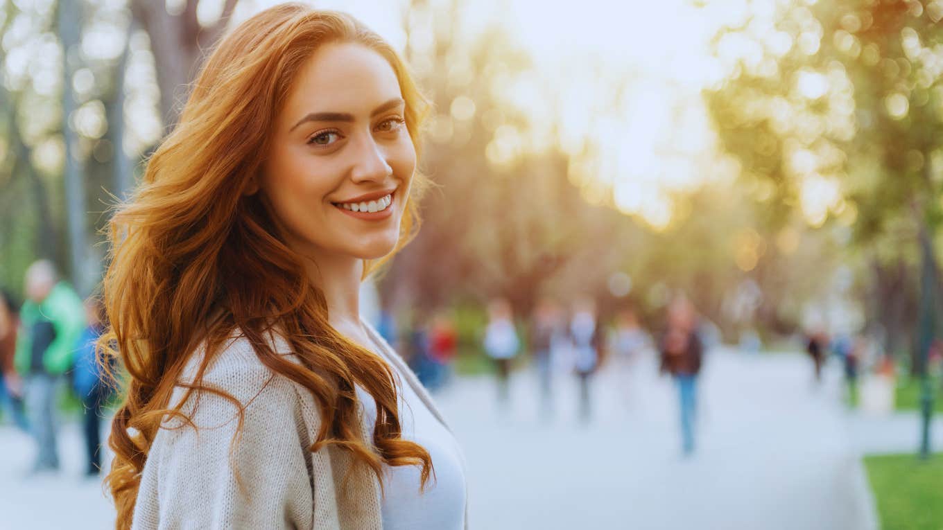 woman smiling outside