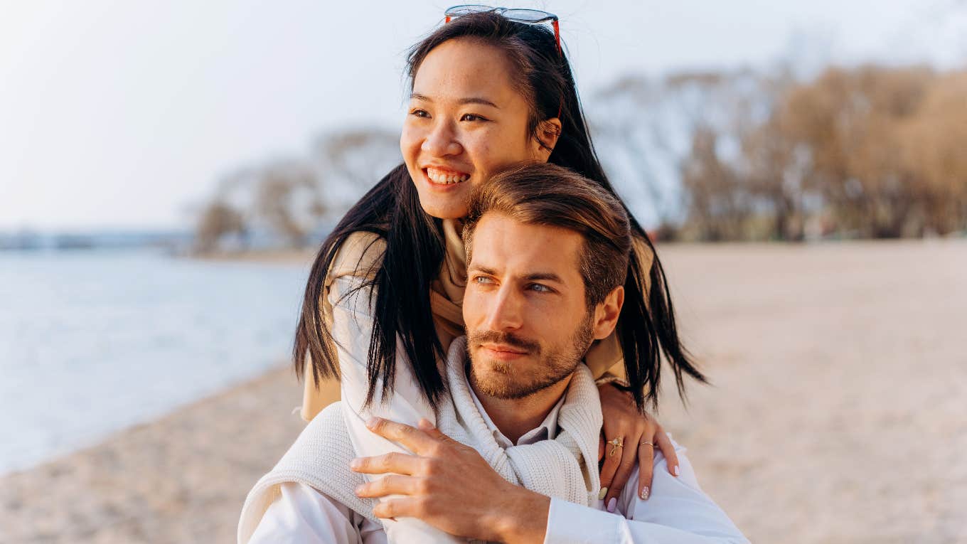 smiling couple on the beach