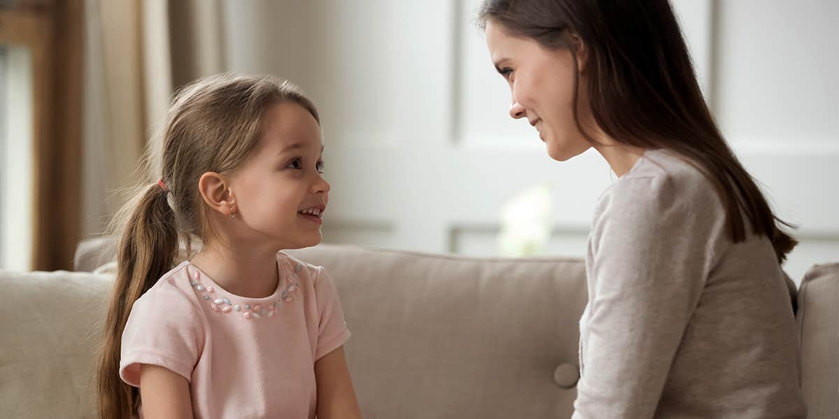 mom talking to daughter