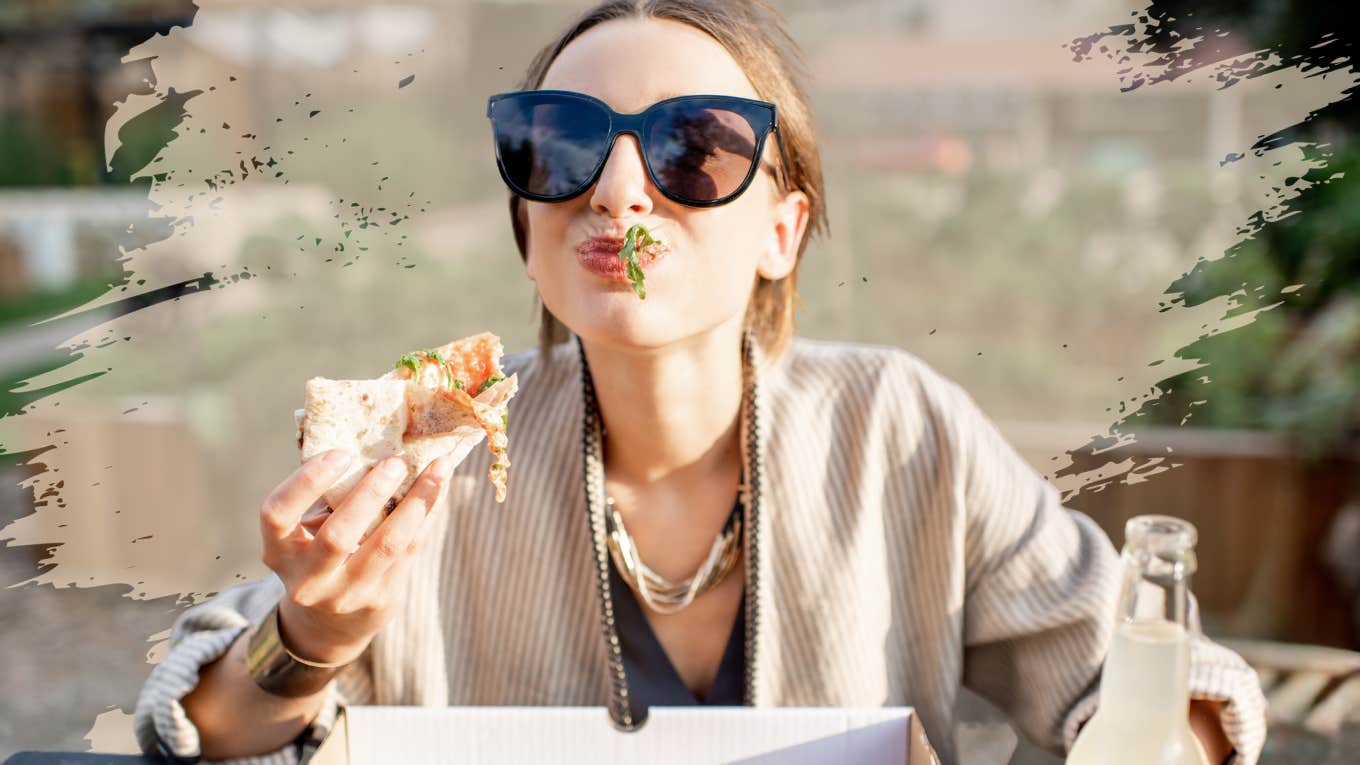 Woman happily nourishing her body with food