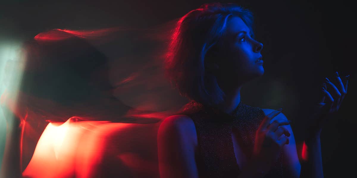 Type X Personality: Positive & Negative Traits woman staring off into the distance wistfully