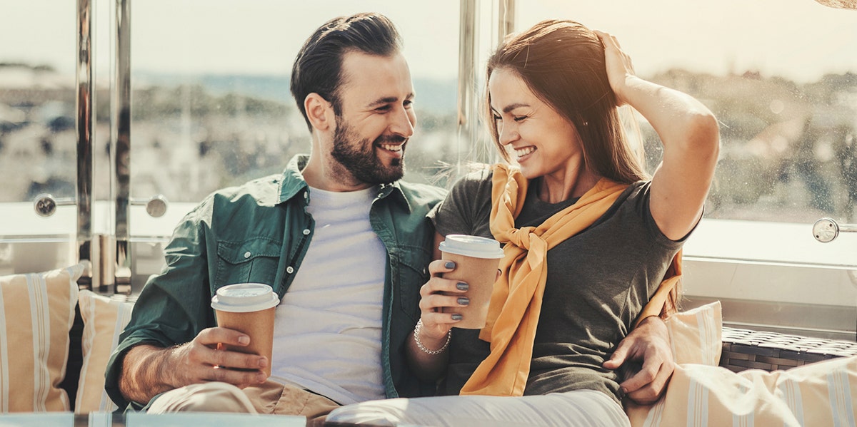 Why People Have A Type, According To Science happy couple sitting together