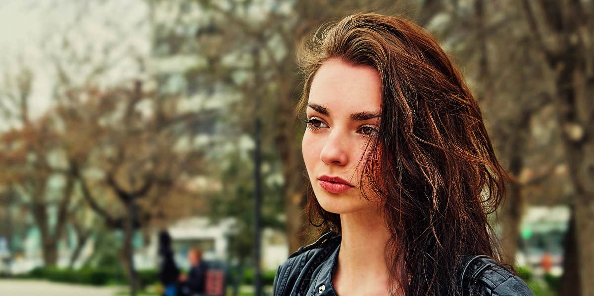 unacceptable-relationship-behavior Pensive woman alone outdoors waits for someone