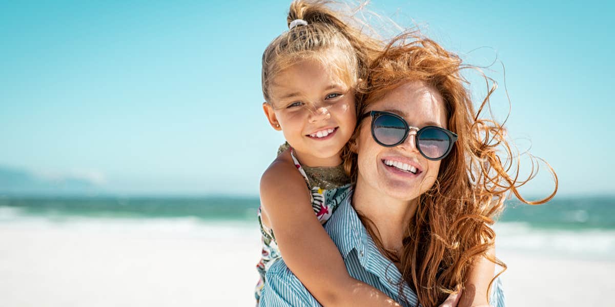 aunt and niece on beach