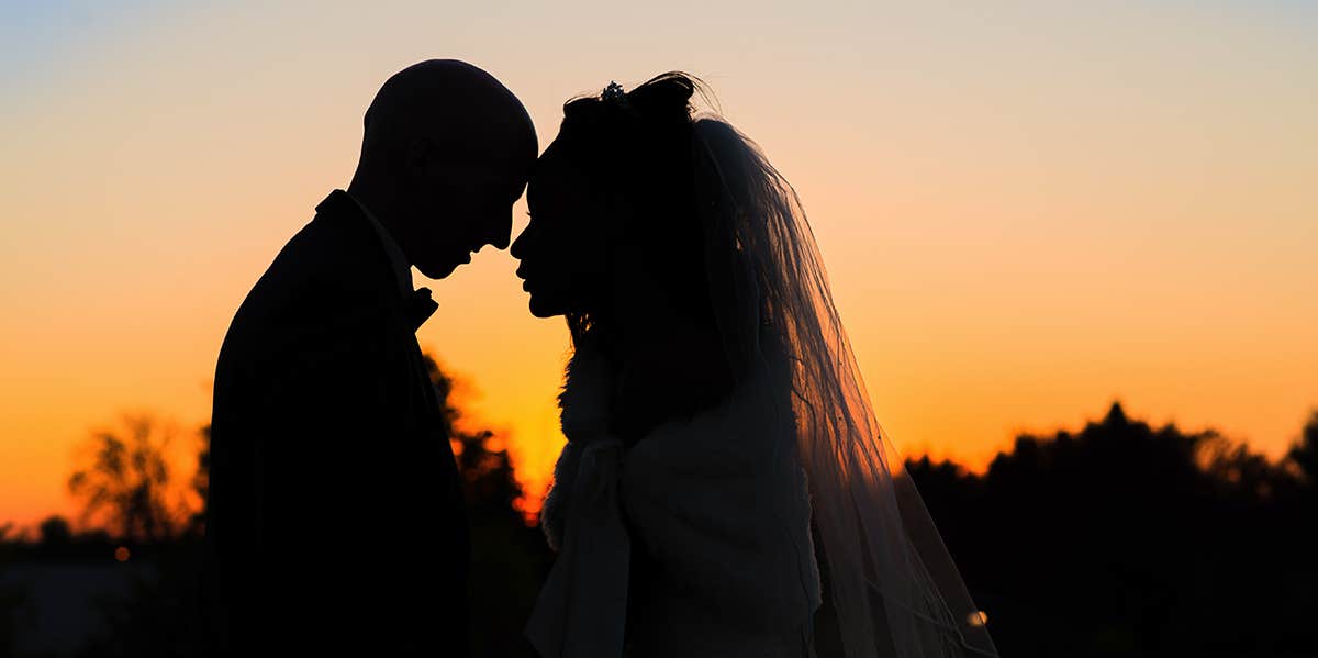 silhouette of bride and groom