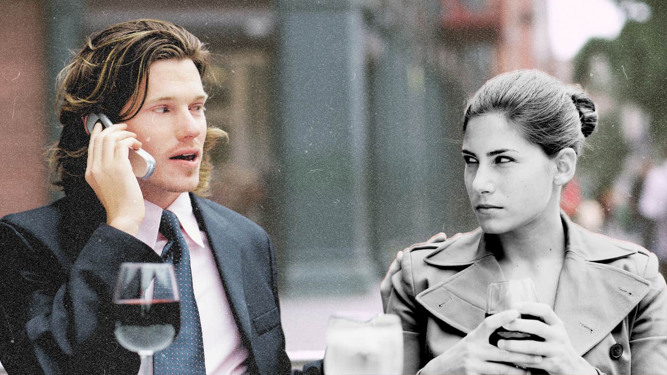 8 Unromantic, Real Reasons I Stopped "Dating" My Husband Married couple on a date, man distracted, woman annoyed