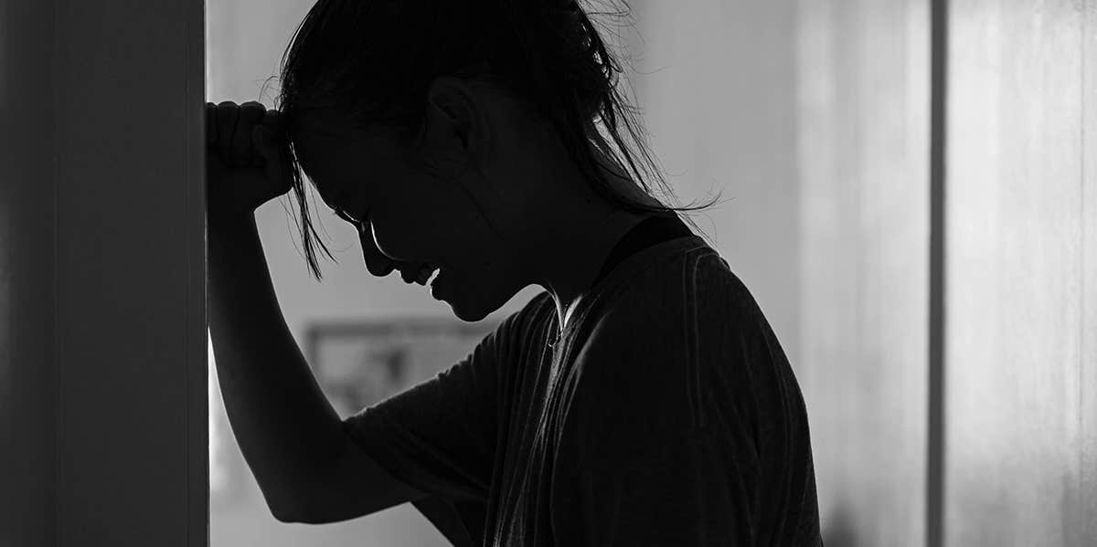 The Untold Despair of Parents with a Chronically Ill Child silhouette of crying mother