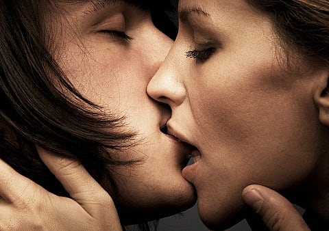 up close look at two people kissing