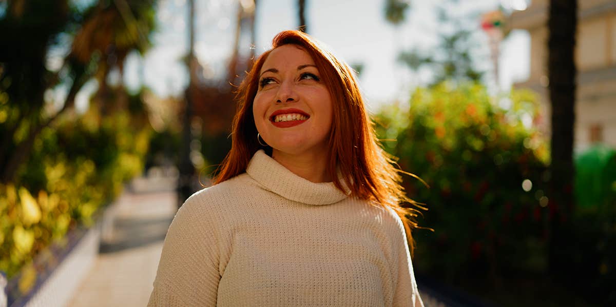 motivated woman walking outside