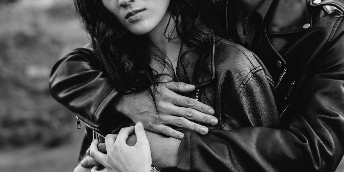 I Used To Be Terrified Of The 'Baggage' I Would Bring To Relationships man hugging woman from behind