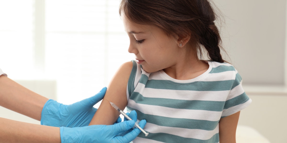 girl getting vaccine