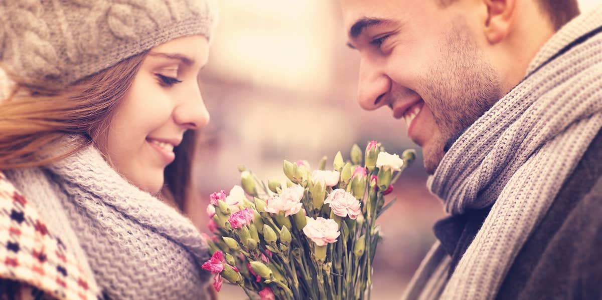 couples giving out flower