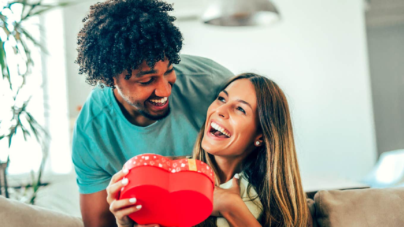 The Real History Of Why And How We Celebrate Valentine's Day couple celebrating Valentine's Day