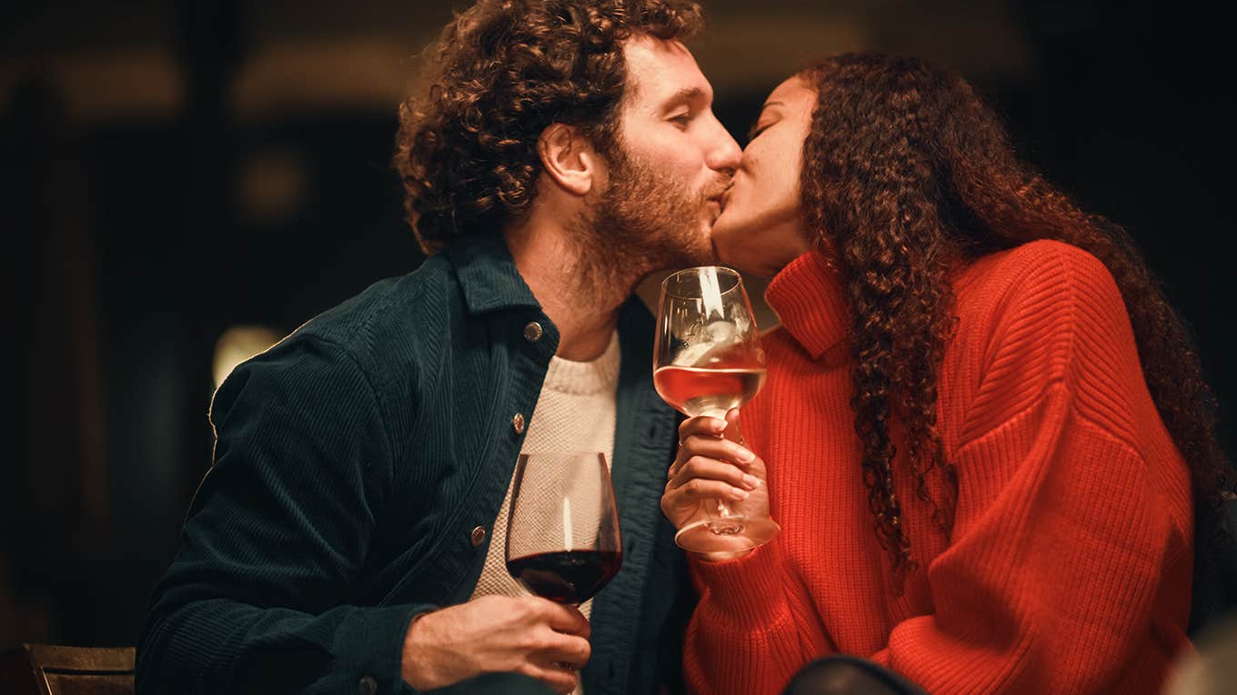 couple kissing on romantic date 