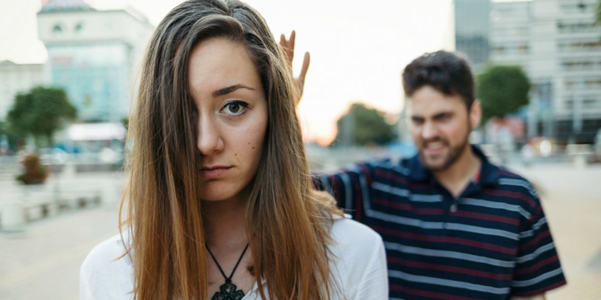 5 Signs You're Being Verbally Abused — And Don't Even Realize It woman being verbally abused