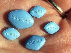 viagra in man's hand