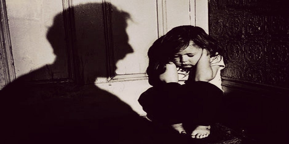 little girl cowers from violent father little girl cowers from violent father