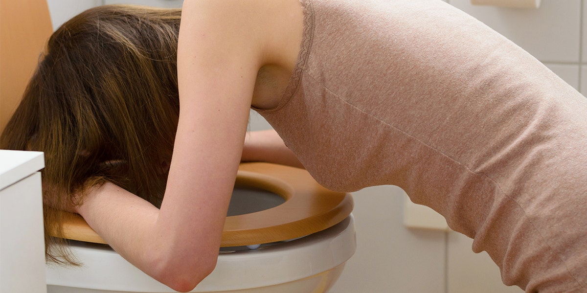 Woman Lives With Disease Where She Can Never Stop Vomiting woman vomiting over the toilet