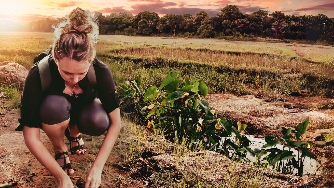 Author collecting the dirt where her uncle died in Hue Vietnam. 