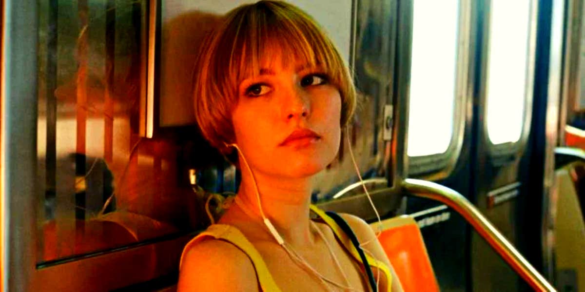 Was Breaking Up A Mistake? 5 Signs You're Right To Regret It woman looking sad and forlorn out the windows of the subway