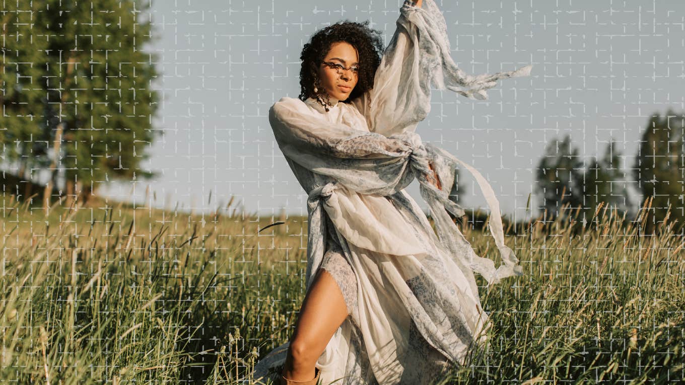 Woman dancing to the beat of her own drum