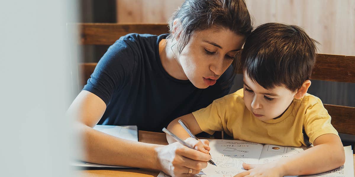 mom helping son with homework