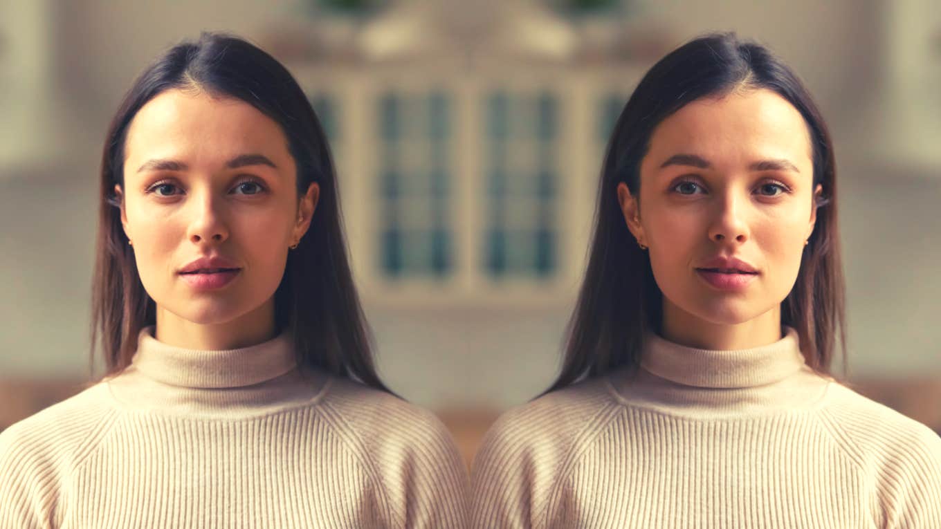 Beautiful young adult woman looking at camera